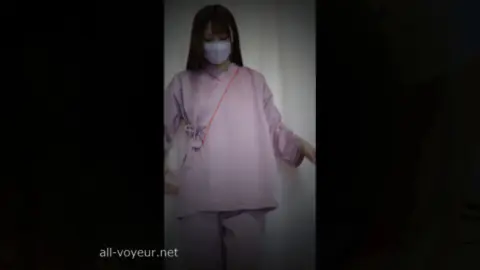 Asian Nurse in Scrubs and Face Mask