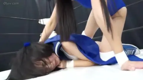 Asian Women Wrestling in Ring