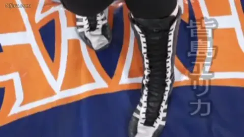 Asian Women Wrestling in Ring