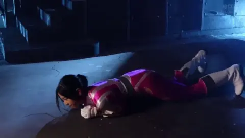 Asian Teen in Superhero Costume