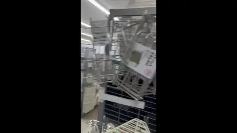 Asian Teens in School Uniforms at Store