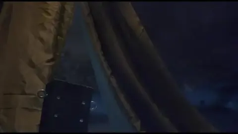 Asian Performers in Costumes by River