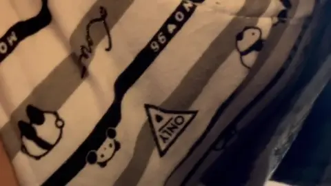 Bending Over and Trying On Clothes