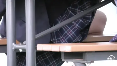 Asian Teen Exposes Thighs in Classroom