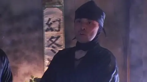 Asian Women in Ninja Costumes