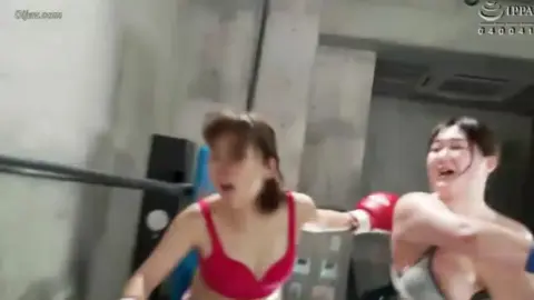 Asian Women in Boxing Gloves Intimate Moments