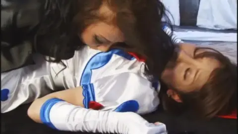 Asian Lesbian Intimacy in Anime Costumes