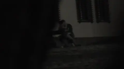 Dark-Haired Couple’s Outdoor Intimacy