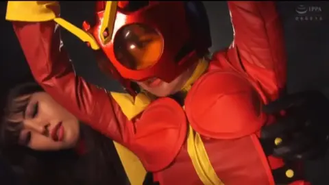 Asian Couple in Red Costume Industrial Fetish Scene