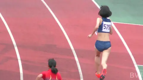 Asian Athletes in Sports Bras Running Track