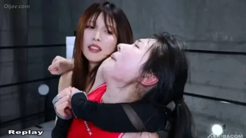 Asian Lesbians Wrestling in Bodysuits