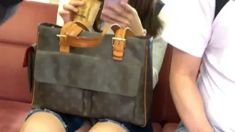 Asian Teen Rides Public Transport