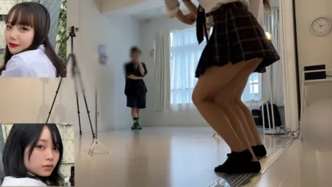 Asian Lesbian Duo Posing in Studio