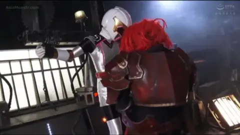 Asian Men in Costumes and Helmets