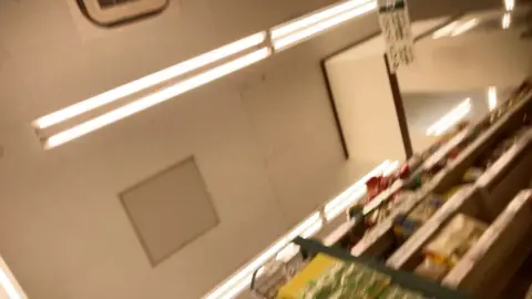 Asian Teen Undresses in Store Fitting Room