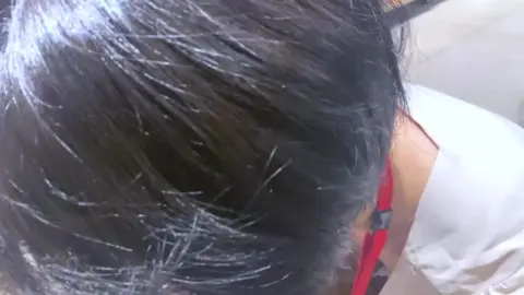 Asian Girl in Store Setting