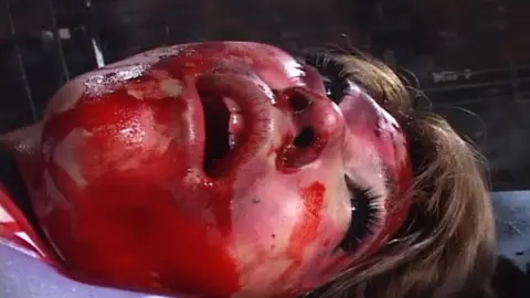 Blonde Woman Tortured with Nails and Hammer