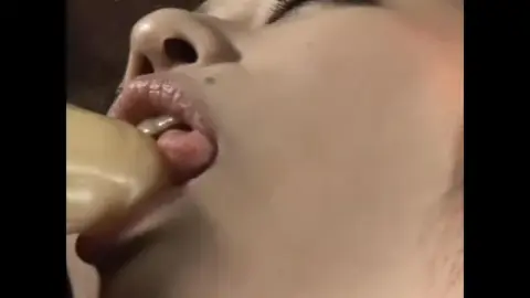 Asian Couple Intimate Moments in Dimly Lit Room