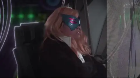 Asian Lesbians in Costumes and Masks