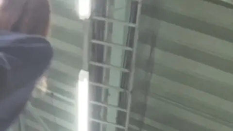 Asian Schoolgirl in Plaid Skirt