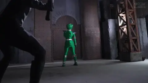 Green Costumed Performer in Fantasy Encounter