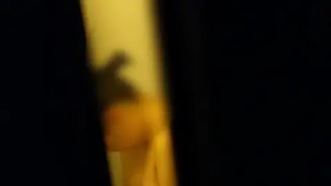 Asian Girl in Bathroom