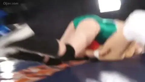 Asian Lesbians Wrestling in Ring