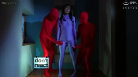 Asian Couples in Morph Suits Intimate Moments