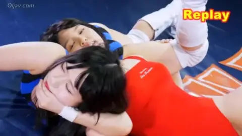 Asian Lesbians Wrestling in Ring