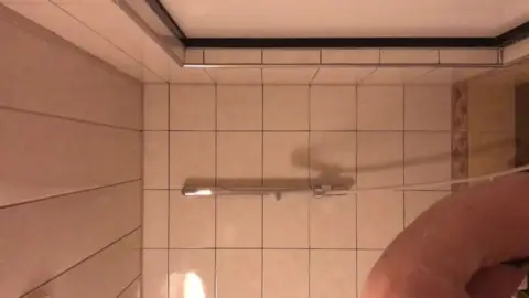 Young Man Showering POV
