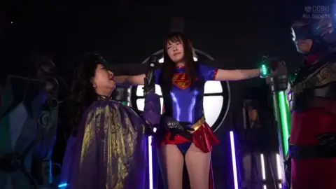 Asian Lesbians in Superwoman Costume BDSM