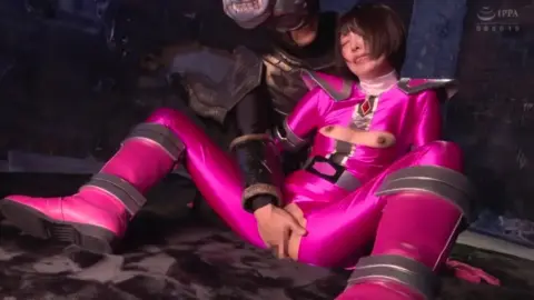 Asian Girl in Pink Jumpsuit in Erotic Scenes