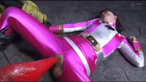 Asian Girl in Pink Costume with Monster Hands