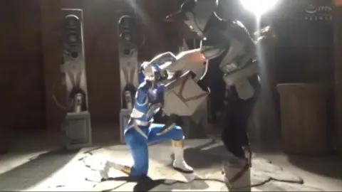 Cosplay Fight Scene with Blonde in Blue Bikini