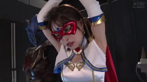 Asian Cosplay Fight Scene with Armor and Cape