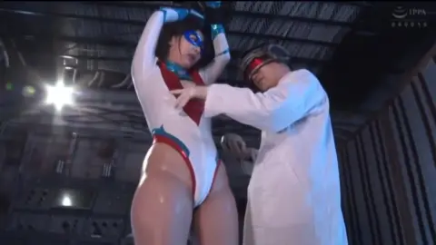 Woman in Bodysuit Fights Restraint in Industrial Setting