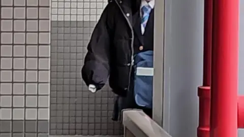 Intimate Bedroom Encounter with Slim Performer