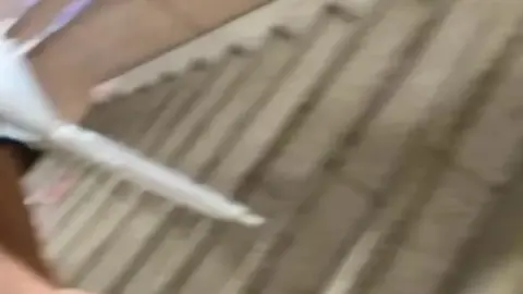 Asian Girl in Black Skirt and Boots