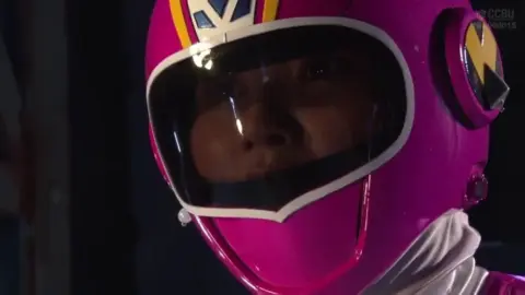 Asian Performers in Pink Costumes Engage in Bondage and Interaction