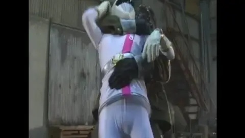 Asian Performers Engaging in Intimate Wrestling and Embracing