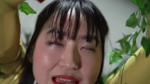 Asian Girl in Fetish Outfits and Bondage