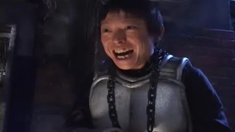 Black Superheroine in Industrial Setting