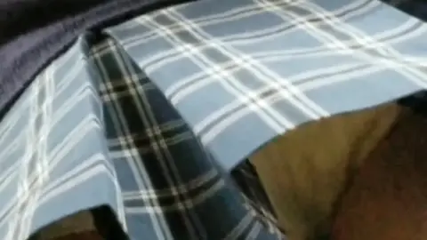 Young Man Exposes Himself in Living Room