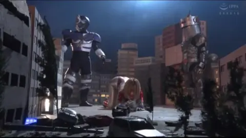Blonde Asian in Metallic Costume Fights Robots