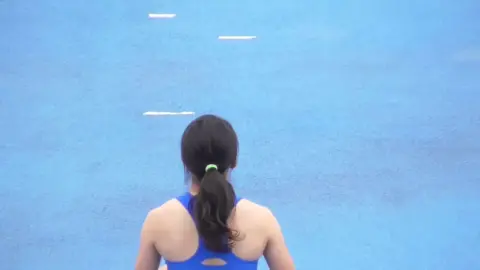 Asian Athletic Beauty in Sports Outfit