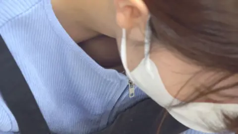 Asian Teen Exposes Cleavage