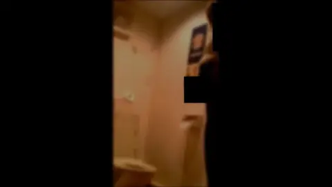 Brunette Woman Urinating in Bathroom