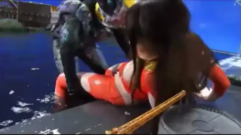 Asian Couple Kissing in Costume