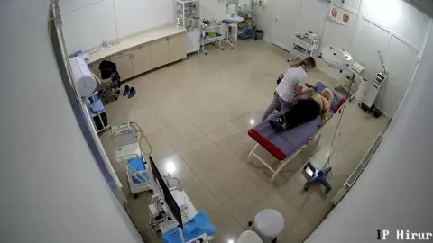 Slim Brunettes Give Massage to Man in White Shirt