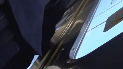 Asian Girl in Black Dress by Train Tracks